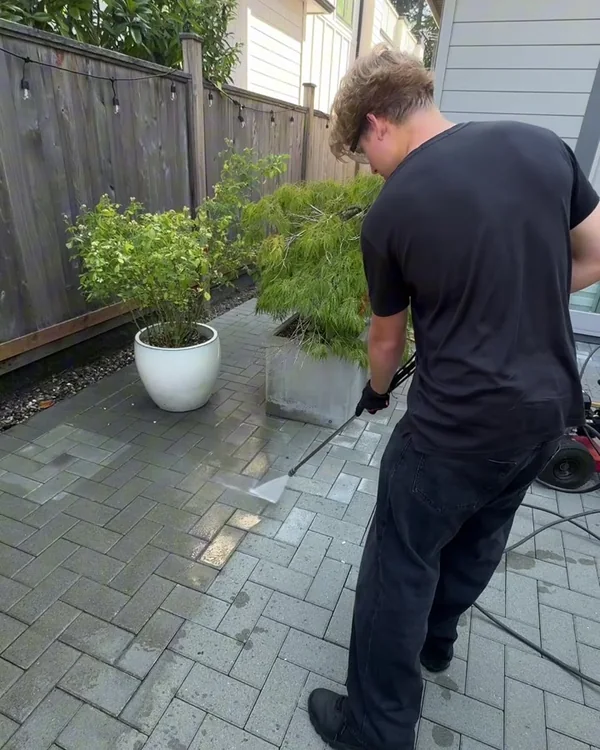 West Wave Wash detail-cleaning an exterior hard surface during a South Surrey project