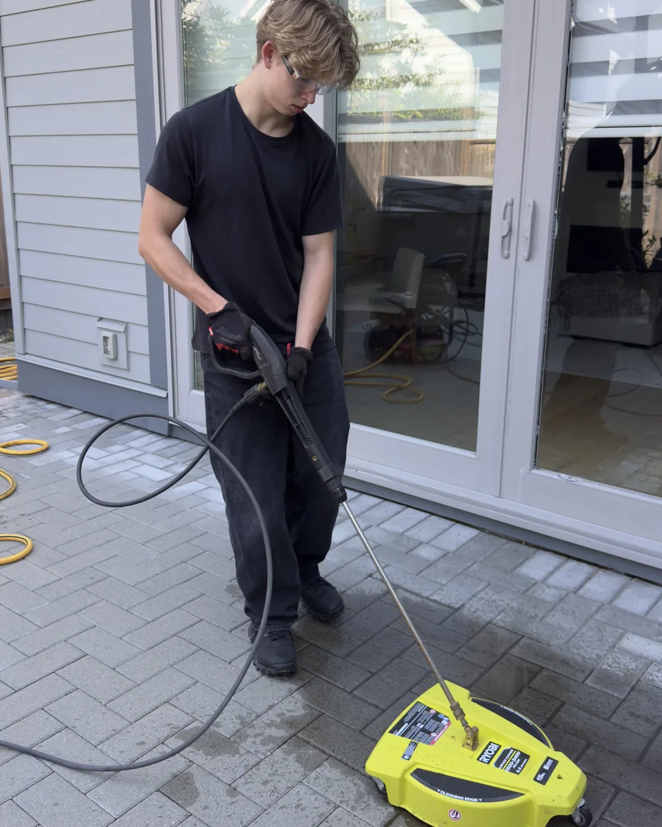 West Wave Wash using a surface cleaner on interlocking pavers